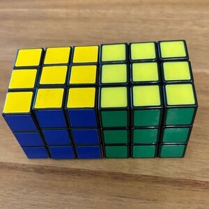 Vibrant Blue, Yellow, and Green Puzzle Cube